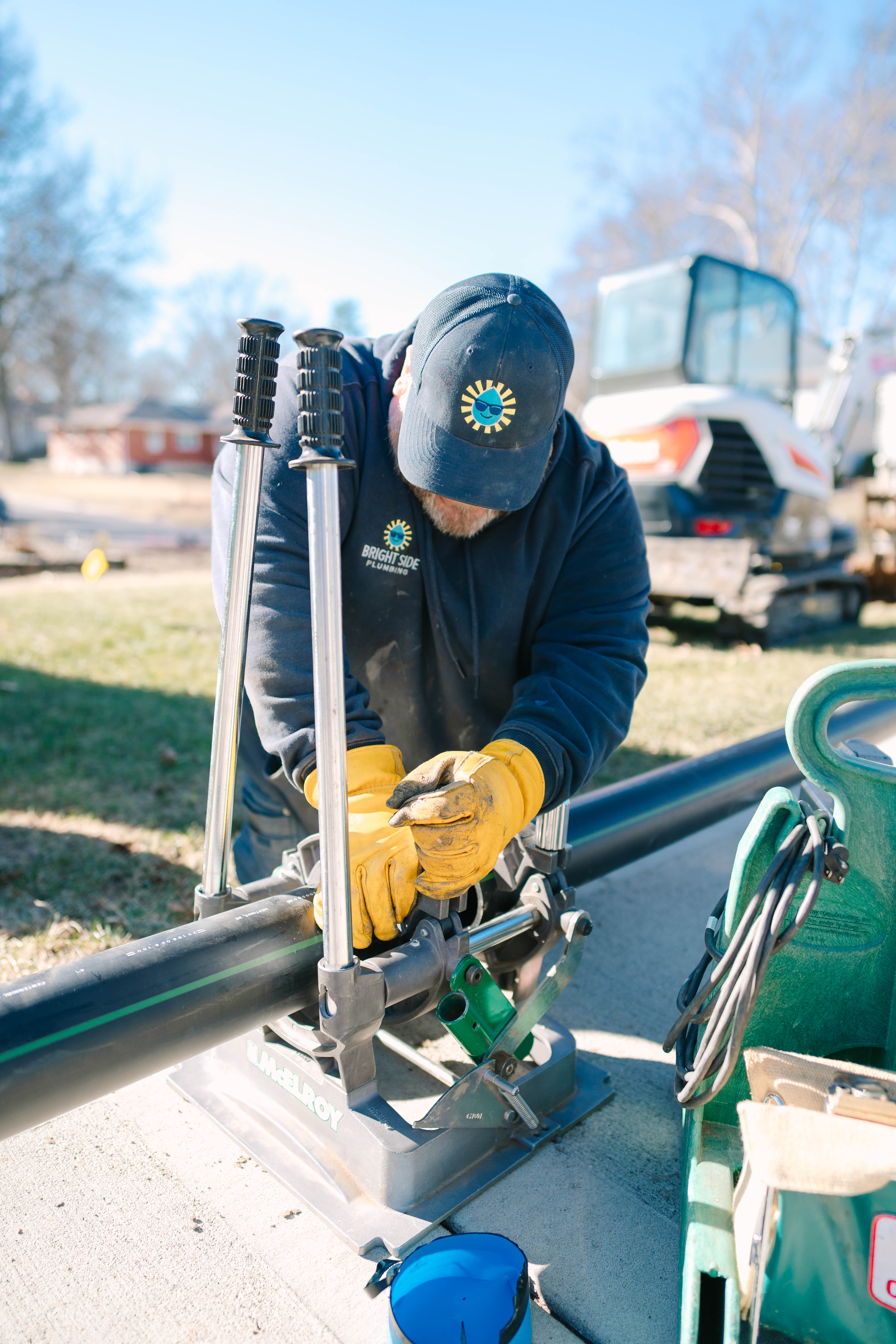 Bright Side Plumbing technician repairing pipe